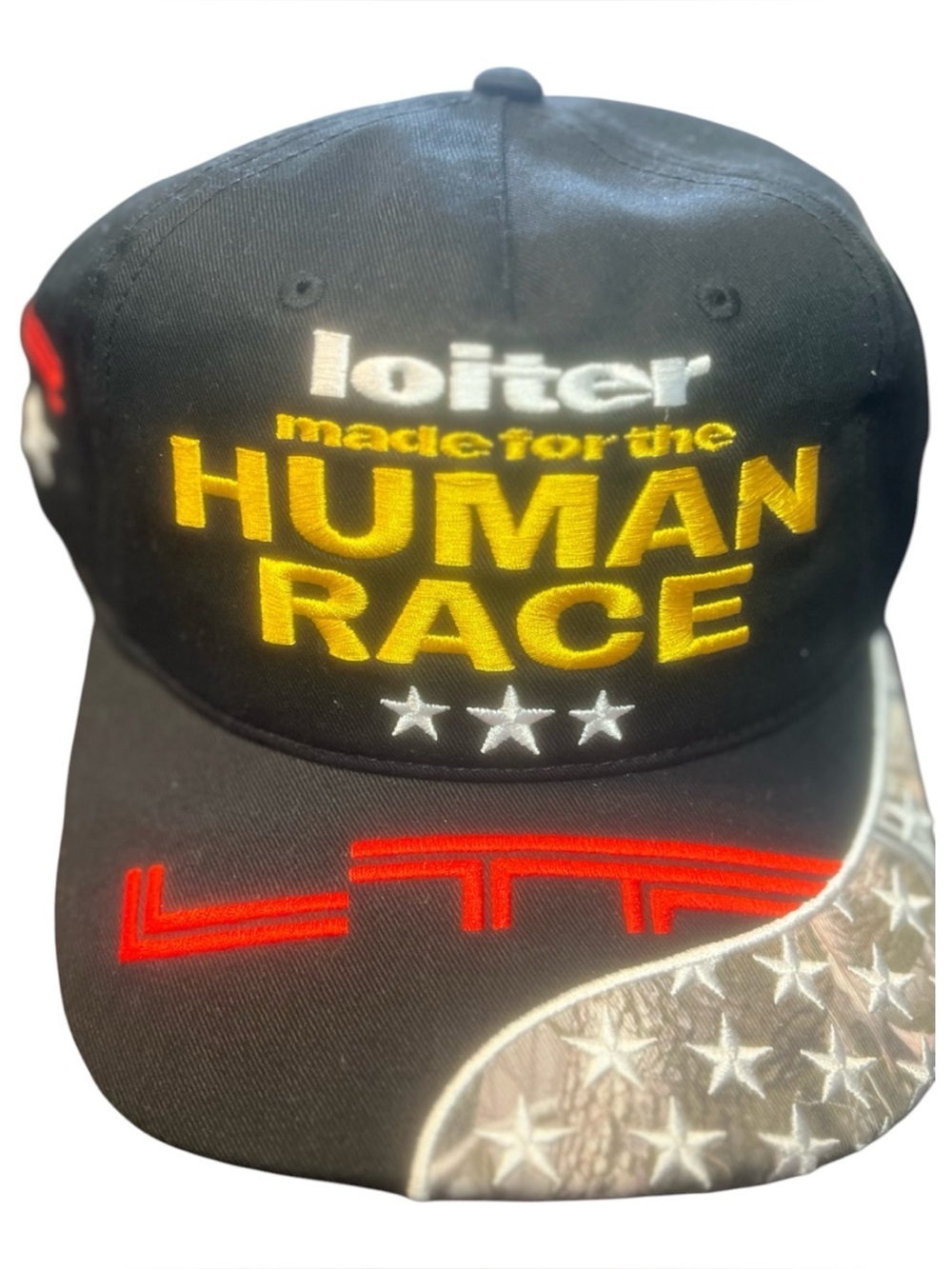 Human Made Black Cap with Yellow 'HUMAN RACE' Embroidery and Red Accents